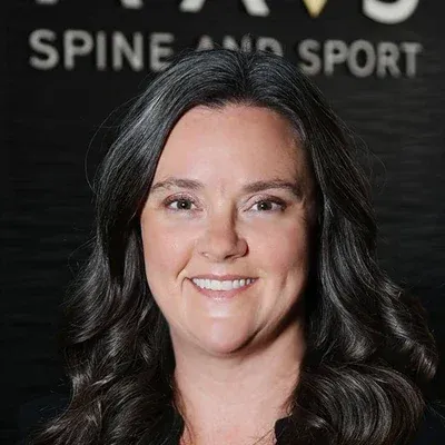 A headshot photo of Meghan, the personal injury director at Axis Spine and Sport - Gilbert