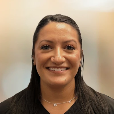 A headshot photo of Justeene