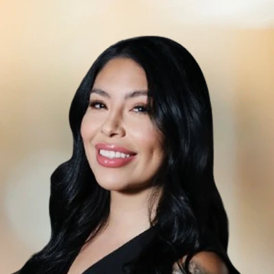 A headshot photo of Sandra