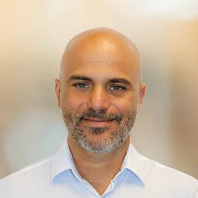 A headshot photo of Dr. Rafic